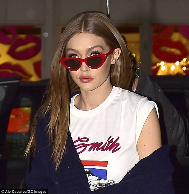 Gigi Hadid rocks Red, White, and Blue in rainy NYC.